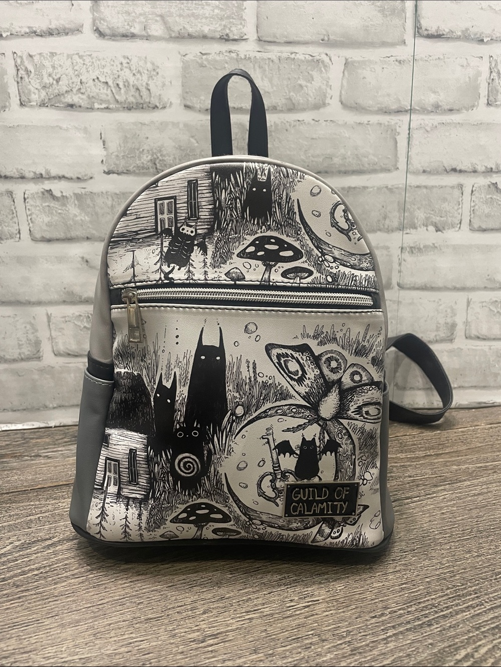 Forest Creatures Mini Backpack by Guild of Calamity. Black white spooky. Used.